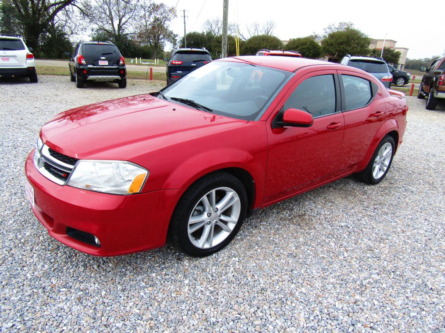 2012 Red Dodge Avenger SXT (1C3CDZEG1CN) with an 3.6L V6 DOHC 24V engine, Automatic transmission, located at 15016 S Hwy 231, Midland City, AL, 36350, (334) 983-3001, 31.306210, -85.495277 - Photo#1